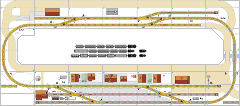 Zeichnung: Gleisplan einer ringförmigen Segmentanlage mit einem Bahnhof und einem Haltepunkt.