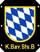 Zeichnung: das bayerische Wappen mit weiß–blauen Rauten.