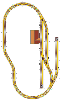 Zeichnung: Gleisplan mit Oval, Ausweich– und zwei Abstellgleisen.