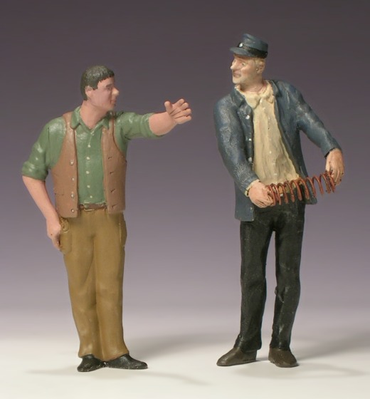 Ein Landwirt diskutiert mit einem Bahnarbeiter, der eine rostige Feder trägt.